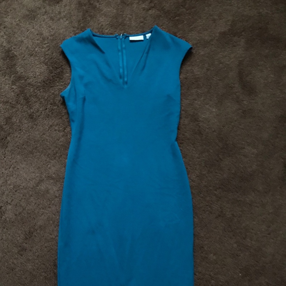 Long just below the knee turquoise dress